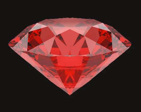 A brilliant cut red diamond on a dark background